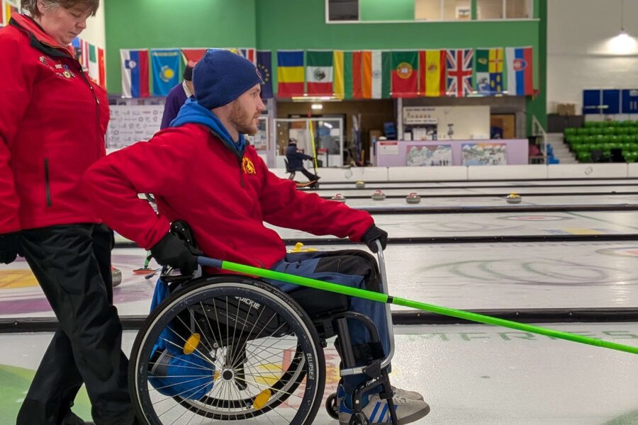 A curler in a wheelchair.