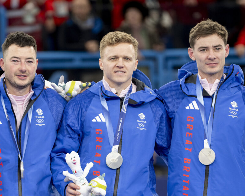 Team GB’s mens team of Bruce Mouat, Grant Hardie, Hammy McMillan JNR & Bobby Lammie receive their silver medals after getting beaten by Canada in the Curling Mens Team event Gold medal Match during Milano Cortina 2026 Winter Olympics 2026.