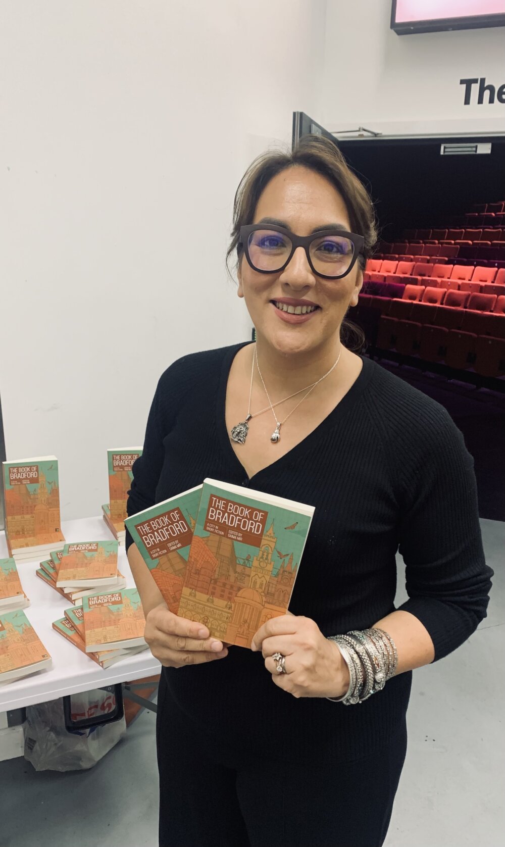 Portrait of The Book of Bradford's editor Saima Mir at the book's launch in Bradford, 2025.
