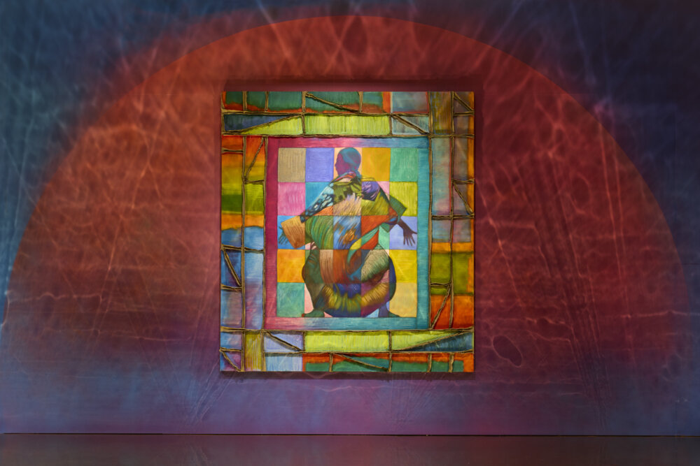 A colourful portrait by Zadie Xa, hanging up in a gallery