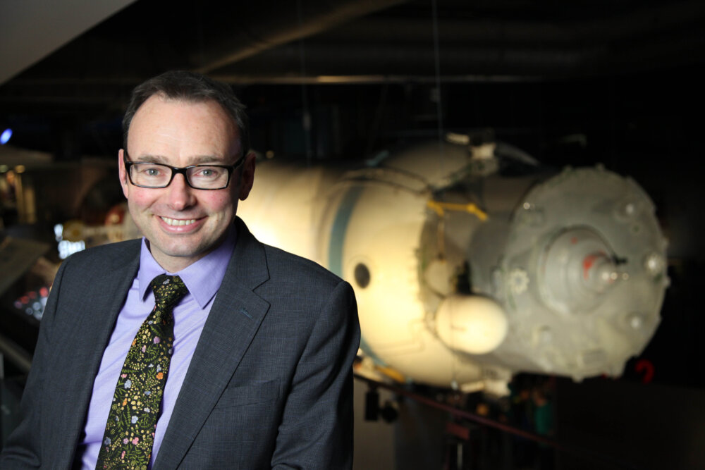 Chas Bishop, CEO National Space Centre, pictured with a Soyuz spacecraft at The National Space Centre, Leicester.