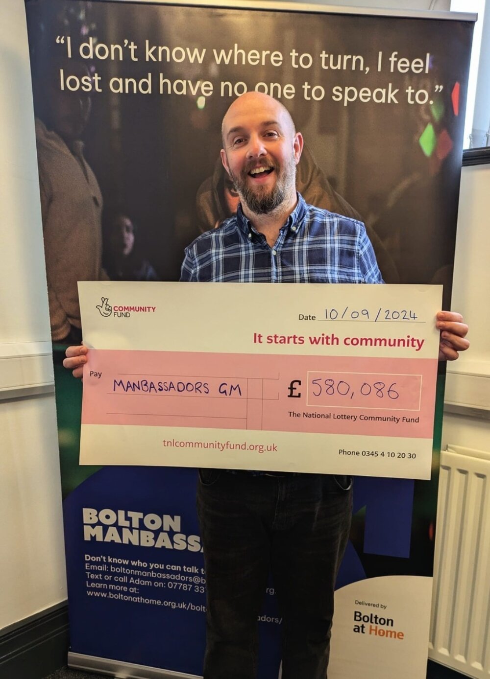 Adam Warbrick celebrating the National Lottery grant that has expanded Manbassadors across Greater Manchester Picture from Manbassadors Bolton at Home