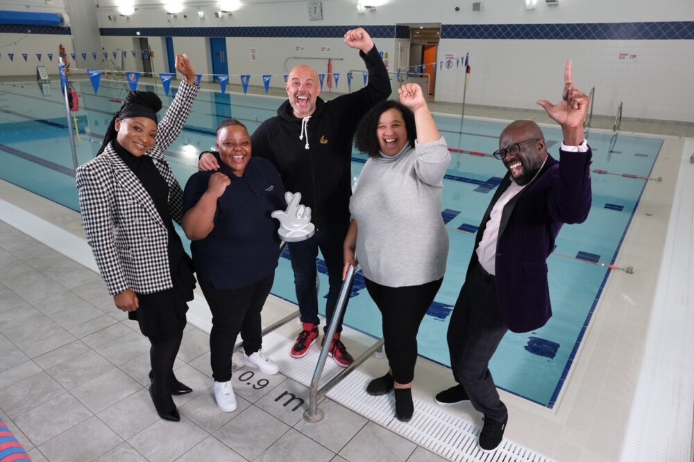 Jason Mohammad celebrates with the Black Swimming Association