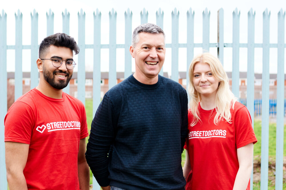 Martin Tilbury, CEO of Street Doctors, with two of the young medic volunteers. (Picture by Street Doctors, 2023)