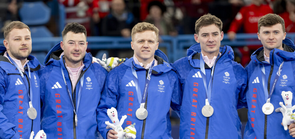 Team GB’s mens team of Bruce Mouat, Grant Hardie, Hammy McMillan JNR & Bobby Lammie receive their silver medals after getting beaten by Canada in the Curling Mens Team event Gold medal Match during Milano Cortina 2026 Winter Olympics 2026.