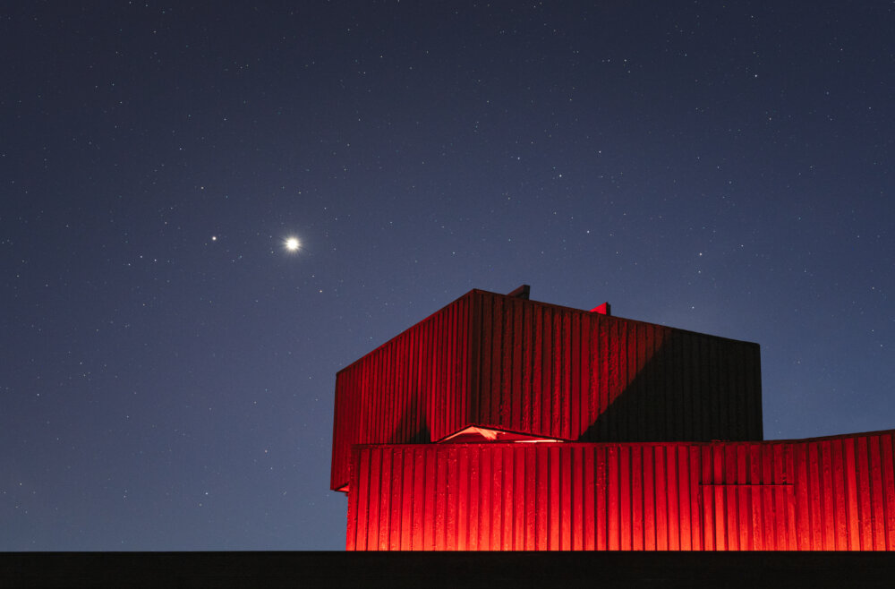 NIght-time astro-photo of Saturn and Venus pictured over Kielder Observatory, a recipient of funds for good causes that took part in Open Week's 2025 mission to say thanks to National Lottery players. (Photo: Dan Monk, Kielder)