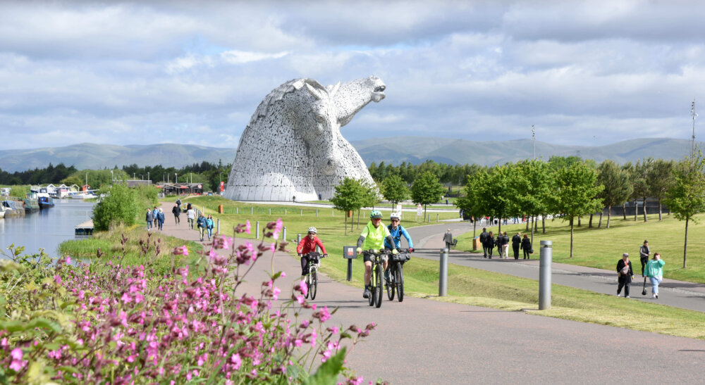 People enjoying outside activities on the Kelpies.