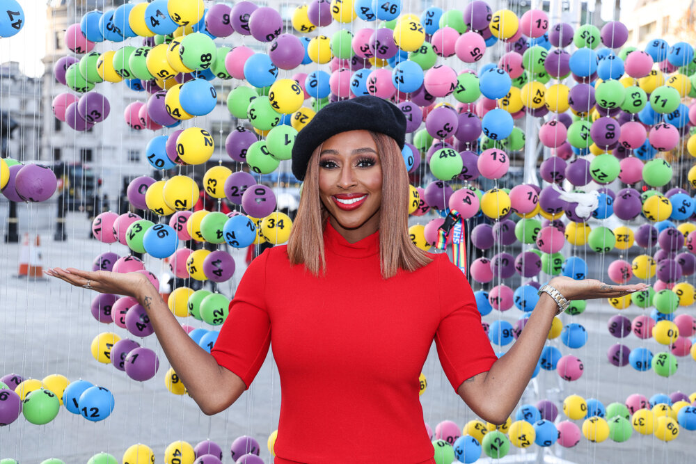 A woman (Alexandra Burke) photographed in the CHANGE installation of Trafalgar Square in London, England.