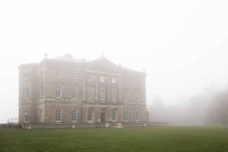 The mansion in the mist at Christmas time at Castle Ward, County Down