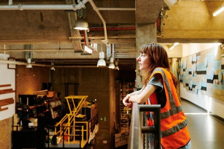 A young person on an NT backstage tour