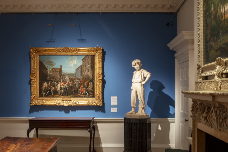 Painting and a sculpture in a historic room