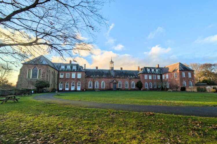 Hartlebury Castle, as seen from its Carriage Circle, on a sunny day.
