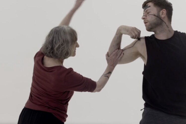 Artistic photograph capturing expressive body movement and creative dance, emphasising motion and flow