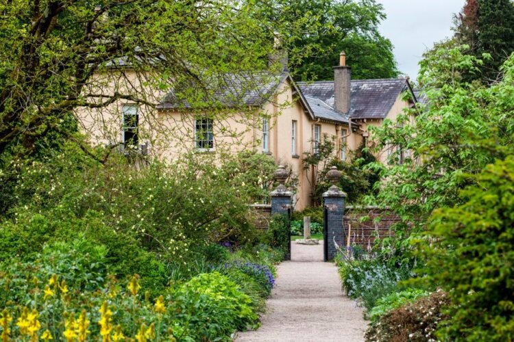 View of the house from the Walled Garden at Rowallane Garden, County Down, in May