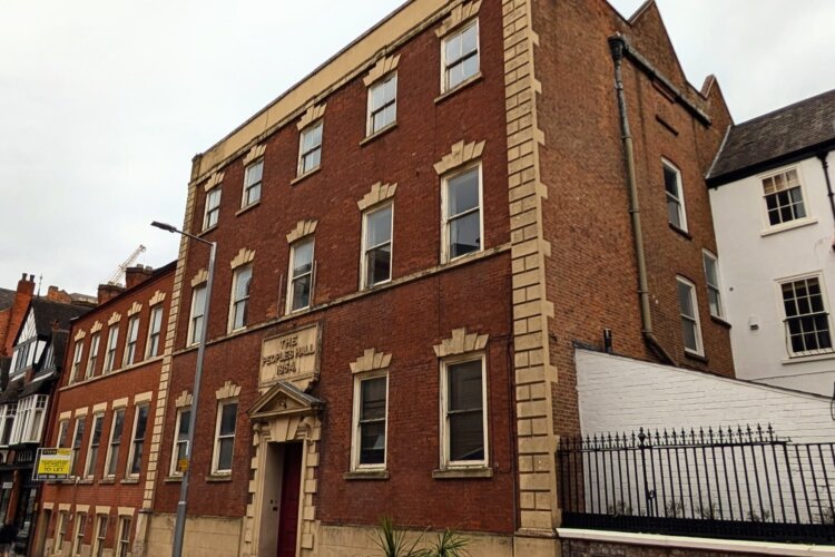 Exterior photo of the People's Hall taken from the street in front of the building.
