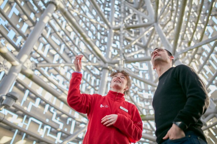 A female tour guide showing a man inside the Kelpie.