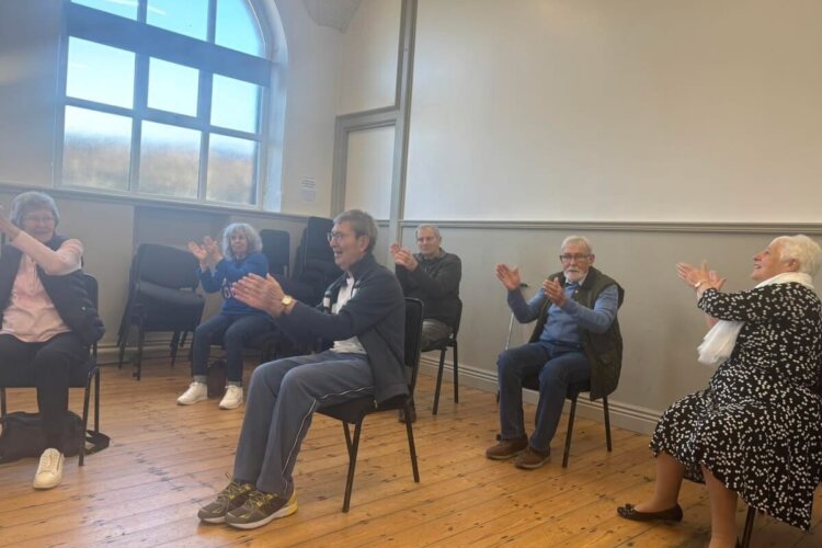 image shows members of Love to Move enjoying a session